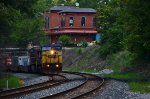 CSX 7720 passes the EL Depot first.